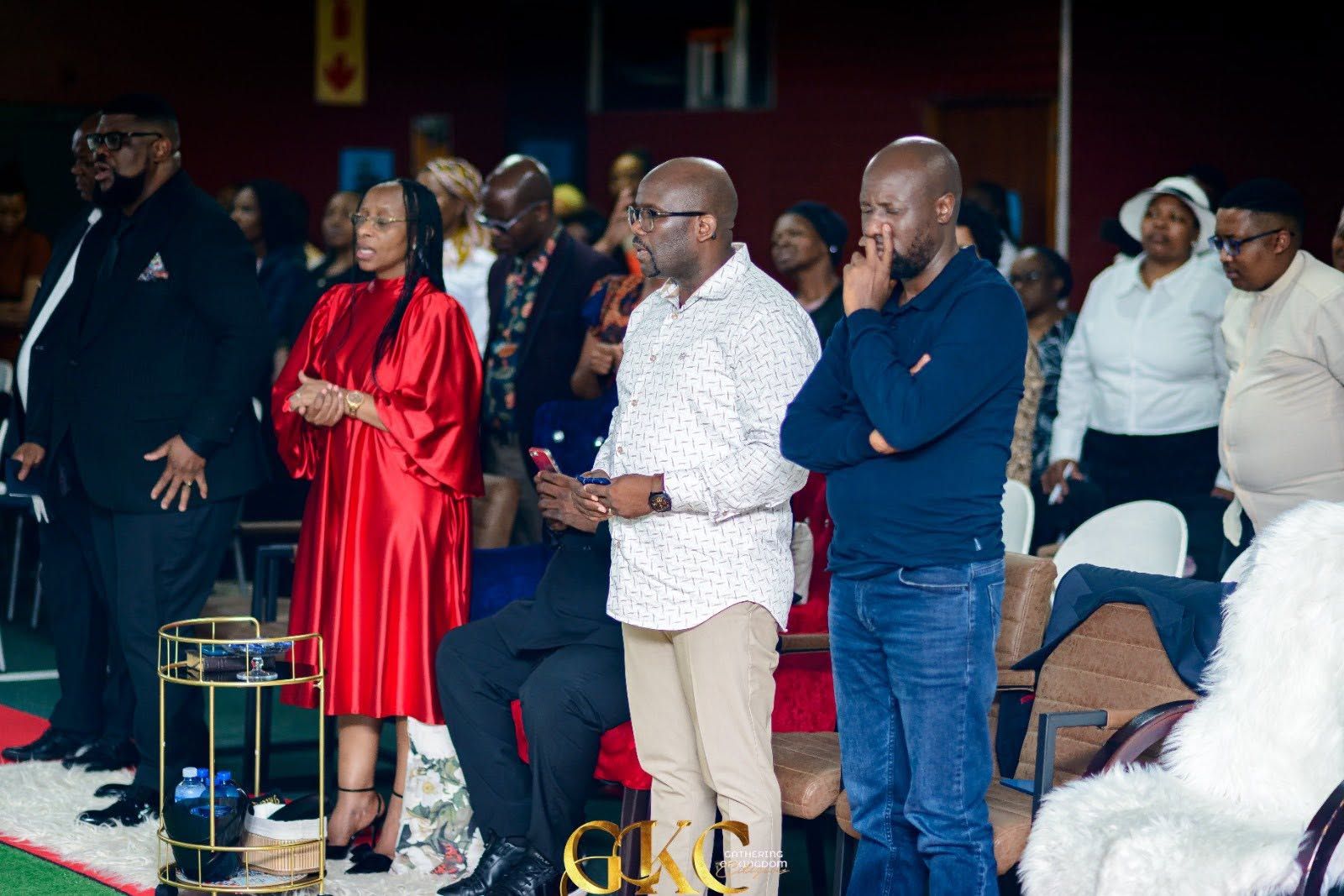 Leaders standing in worship
